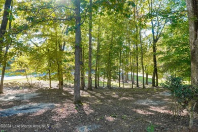 This 3 bedroom, 2 bath one level log home sits on a large flat on Stillwaters Golf and Country Club in Alabama - for sale on GolfHomes.com, golf home, golf lot