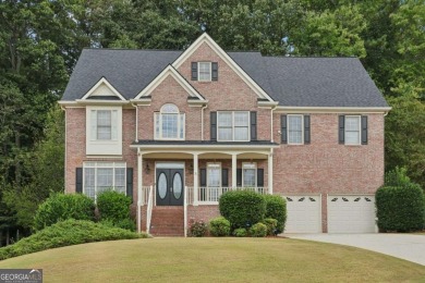 Priced to sell! Come see this beautiful two-story home with a on Brookstone Golf and Country Club in Georgia - for sale on GolfHomes.com, golf home, golf lot