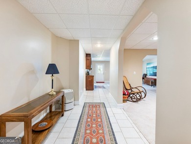 Nestled in the prestigious Windermere community, this on Windermere Golf Club in Georgia - for sale on GolfHomes.com, golf home, golf lot