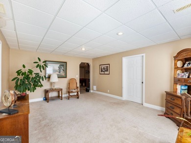 Nestled in the prestigious Windermere community, this on Windermere Golf Club in Georgia - for sale on GolfHomes.com, golf home, golf lot