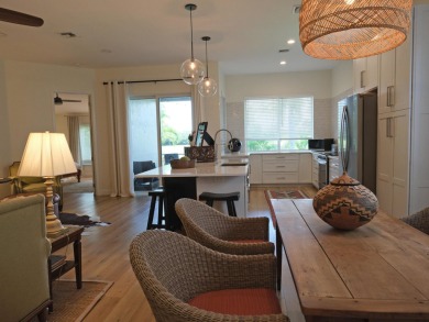 With a newer roof and full impact windows, this is a turnkey on The Wanderers Club in Florida - for sale on GolfHomes.com, golf home, golf lot