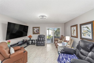 Welcome to this updated Corpus Christi model in The Villages on Nancy Lopez Legacy Golf and Country Club in Florida - for sale on GolfHomes.com, golf home, golf lot