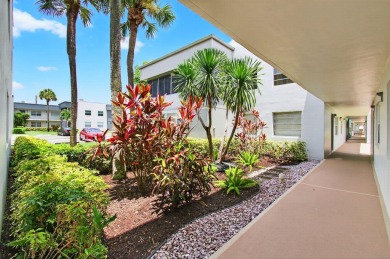 Check out this Ground-Floor Corner Unit with Fascinating Golf on Kings Point Golf -Flanders Way in Florida - for sale on GolfHomes.com, golf home, golf lot