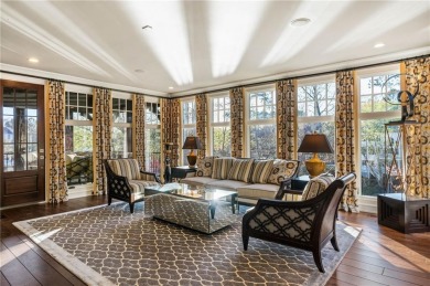 Crafted with meticulous attention to detail, this extensively on The Golf Club of Georgia in Georgia - for sale on GolfHomes.com, golf home, golf lot