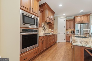 Discover elevated golf living in this exquisite golf home on Reynolds Lake Oconee - The Oconee in Georgia - for sale on GolfHomes.com, golf home, golf lot