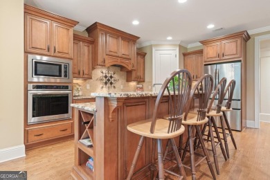 Discover elevated golf living in this exquisite golf home on Reynolds Lake Oconee - The Oconee in Georgia - for sale on GolfHomes.com, golf home, golf lot