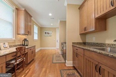 Discover elevated golf living in this exquisite golf home on Reynolds Lake Oconee - The Oconee in Georgia - for sale on GolfHomes.com, golf home, golf lot