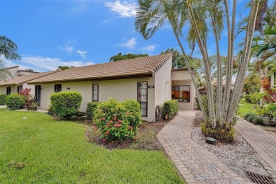 Rarely available corner unit located in the desired community of on Jacaranda Golf Club in Florida - for sale on GolfHomes.com, golf home, golf lot