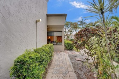 Rarely available corner unit located in the desired community of on Jacaranda Golf Club in Florida - for sale on GolfHomes.com, golf home, golf lot