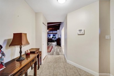 Rarely available corner unit located in the desired community of on Jacaranda Golf Club in Florida - for sale on GolfHomes.com, golf home, golf lot