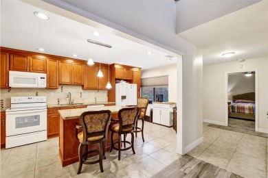 Rarely available corner unit located in the desired community of on Jacaranda Golf Club in Florida - for sale on GolfHomes.com, golf home, golf lot