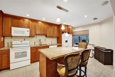 Rarely available corner unit located in the desired community of on Jacaranda Golf Club in Florida - for sale on GolfHomes.com, golf home, golf lot