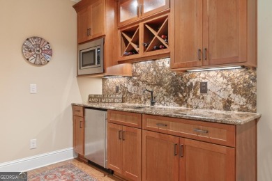 Discover elevated golf living in this exquisite golf home on Reynolds Lake Oconee - The Oconee in Georgia - for sale on GolfHomes.com, golf home, golf lot