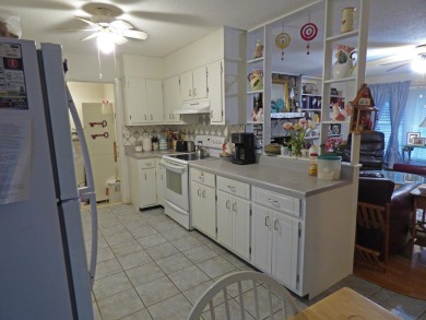 HOME WITH LARGE SHOP AND PRIVACY!  1,492 square foot home great on Cherokee Village North Course in Arkansas - for sale on GolfHomes.com, golf home, golf lot