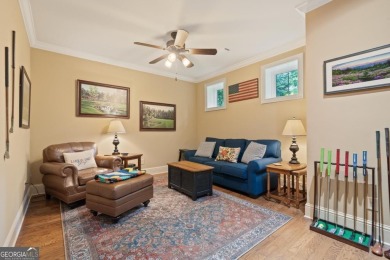 Discover elevated golf living in this exquisite golf home on Reynolds Lake Oconee - The Oconee in Georgia - for sale on GolfHomes.com, golf home, golf lot