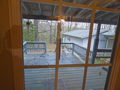 HOME WITH LARGE SHOP AND PRIVACY!  1,492 square foot home great on Cherokee Village North Course in Arkansas - for sale on GolfHomes.com, golf home, golf lot