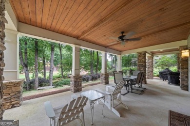 Discover elevated golf living in this exquisite golf home on Reynolds Lake Oconee - The Oconee in Georgia - for sale on GolfHomes.com, golf home, golf lot