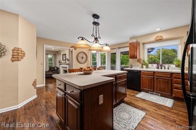 This treasured move-in ready 4-bedroom, 2.5 bathroom brick on Cracklewood Golf Club in Michigan - for sale on GolfHomes.com, golf home, golf lot