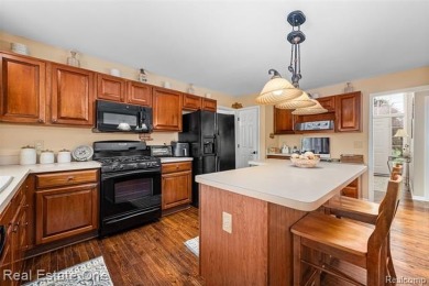 This treasured move-in ready 4-bedroom, 2.5 bathroom brick on Cracklewood Golf Club in Michigan - for sale on GolfHomes.com, golf home, golf lot