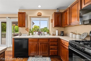 This treasured move-in ready 4-bedroom, 2.5 bathroom brick on Cracklewood Golf Club in Michigan - for sale on GolfHomes.com, golf home, golf lot