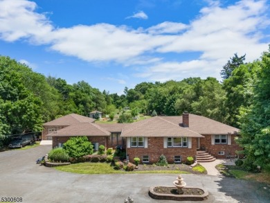 Welcome to this stunning 4-bedroom, 3-bath home that has been on Spooky Brook Golf Course in New Jersey - for sale on GolfHomes.com, golf home, golf lot