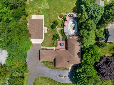 Welcome to this stunning 4-bedroom, 3-bath home that has been on Spooky Brook Golf Course in New Jersey - for sale on GolfHomes.com, golf home, golf lot