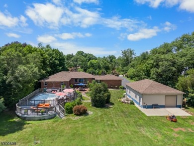 Welcome to this stunning 4-bedroom, 3-bath home that has been on Spooky Brook Golf Course in New Jersey - for sale on GolfHomes.com, golf home, golf lot