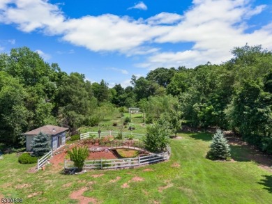 Welcome to this stunning 4-bedroom, 3-bath home that has been on Spooky Brook Golf Course in New Jersey - for sale on GolfHomes.com, golf home, golf lot