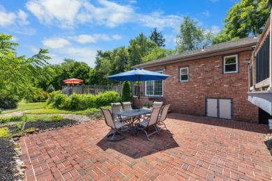 Welcome to this stunning 4-bedroom, 3-bath home that has been on Spooky Brook Golf Course in New Jersey - for sale on GolfHomes.com, golf home, golf lot