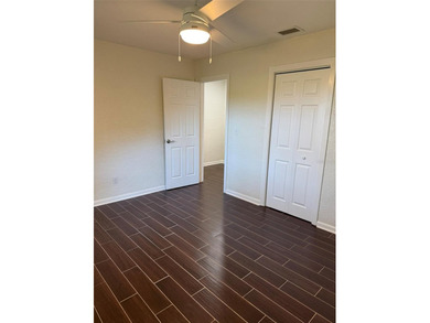 Beautiful, updated 2-bedroom, 1-bath home situated on nearly a on Clearwater Executive Golf Course in Florida - for sale on GolfHomes.com, golf home, golf lot