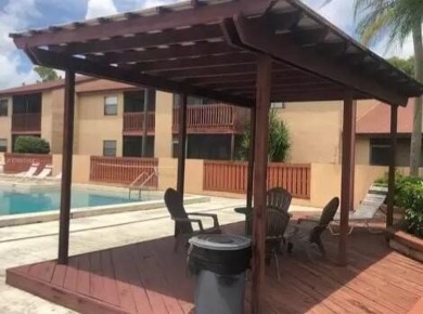 Spacious 2bed/2bath condo. Move-in ready. Excellent location in on Village Golf Club in Florida - for sale on GolfHomes.com, golf home, golf lot