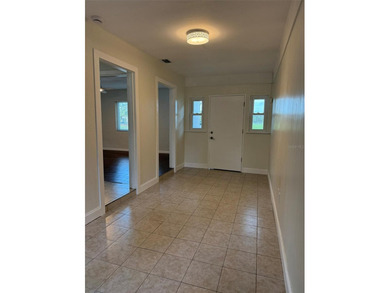 Beautiful, updated 2-bedroom, 1-bath home situated on nearly a on Clearwater Executive Golf Course in Florida - for sale on GolfHomes.com, golf home, golf lot