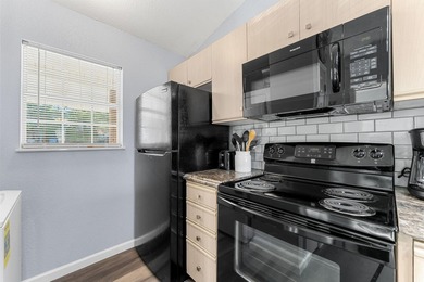 Welcome to 34 Golfshores Drive, Unit 27 -- a beautifully updated on Pointe Royale Village Country Club in Missouri - for sale on GolfHomes.com, golf home, golf lot