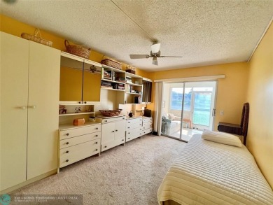 WATERVIEW! FIRST FLOOR, TWO BEDROOM, TWO FULL BATH HOME WITH A on Hillsboro Pines Golf in Florida - for sale on GolfHomes.com, golf home, golf lot