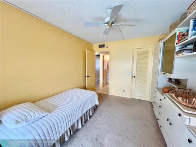 WATERVIEW! FIRST FLOOR, TWO BEDROOM, TWO FULL BATH HOME WITH A on Hillsboro Pines Golf in Florida - for sale on GolfHomes.com, golf home, golf lot