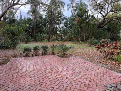 Beautiful, updated 2-bedroom, 1-bath home situated on nearly a on Clearwater Executive Golf Course in Florida - for sale on GolfHomes.com, golf home, golf lot