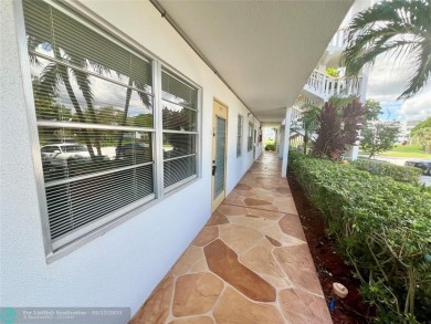 WATERVIEW! FIRST FLOOR, TWO BEDROOM, TWO FULL BATH HOME WITH A on Hillsboro Pines Golf in Florida - for sale on GolfHomes.com, golf home, golf lot