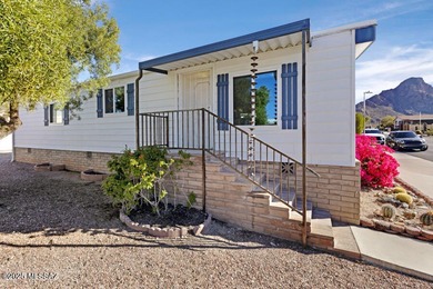 Charming home in great condition with awesome patio and fencing on Tucson Estates Golf Course in Arizona - for sale on GolfHomes.com, golf home, golf lot