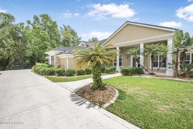 Welcome to 1766 Roscoe Turner Trail, a distinguished luxury on Spruce Creek Golf Club in Florida - for sale on GolfHomes.com, golf home, golf lot