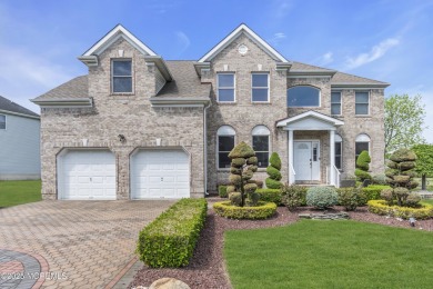 Welcome to Manalapan's finest, newer build section of The Grande on Battleground Country Club in New Jersey - for sale on GolfHomes.com, golf home, golf lot