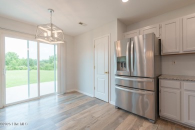 Don't miss out on this spacious home in the sought after Eagle on Eagle Creek Golf Club and Grill in North Carolina - for sale on GolfHomes.com, golf home, golf lot