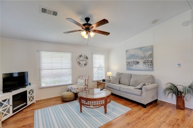 Well-maintained 2-bedroom, 2 bath home in the desirable Barefoot on Barefoot Bay Golf Course in Florida - for sale on GolfHomes.com, golf home, golf lot