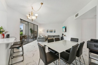 Welcome Home! Step into this light and bright first floor condo on Boca Pointe Country Club in Florida - for sale on GolfHomes.com, golf home, golf lot
