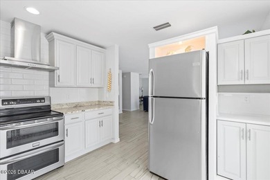 COASTAL LIVING with CHARACTER... Where MORNINGS START ON THE on Palm Harbor Golf Club in Florida - for sale on GolfHomes.com, golf home, golf lot