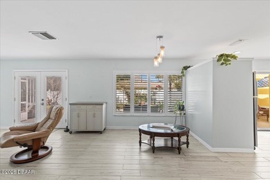 COASTAL LIVING with CHARACTER... Where MORNINGS START ON THE on Palm Harbor Golf Club in Florida - for sale on GolfHomes.com, golf home, golf lot