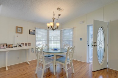 Well-maintained 2-bedroom, 2 bath home in the desirable Barefoot on Barefoot Bay Golf Course in Florida - for sale on GolfHomes.com, golf home, golf lot