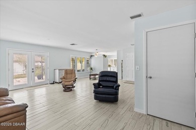 COASTAL LIVING with CHARACTER... Where MORNINGS START ON THE on Palm Harbor Golf Club in Florida - for sale on GolfHomes.com, golf home, golf lot