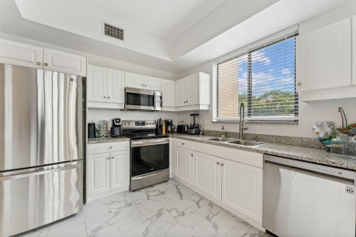Welcome Home! Step into this light and bright first floor condo on Boca Pointe Country Club in Florida - for sale on GolfHomes.com, golf home, golf lot