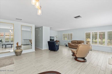 COASTAL LIVING with CHARACTER... Where MORNINGS START ON THE on Palm Harbor Golf Club in Florida - for sale on GolfHomes.com, golf home, golf lot