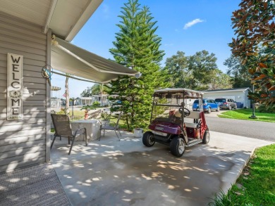 This high end Manufactured home on an Ultimately landscaped on Water Oak Country Club Estates in Florida - for sale on GolfHomes.com, golf home, golf lot